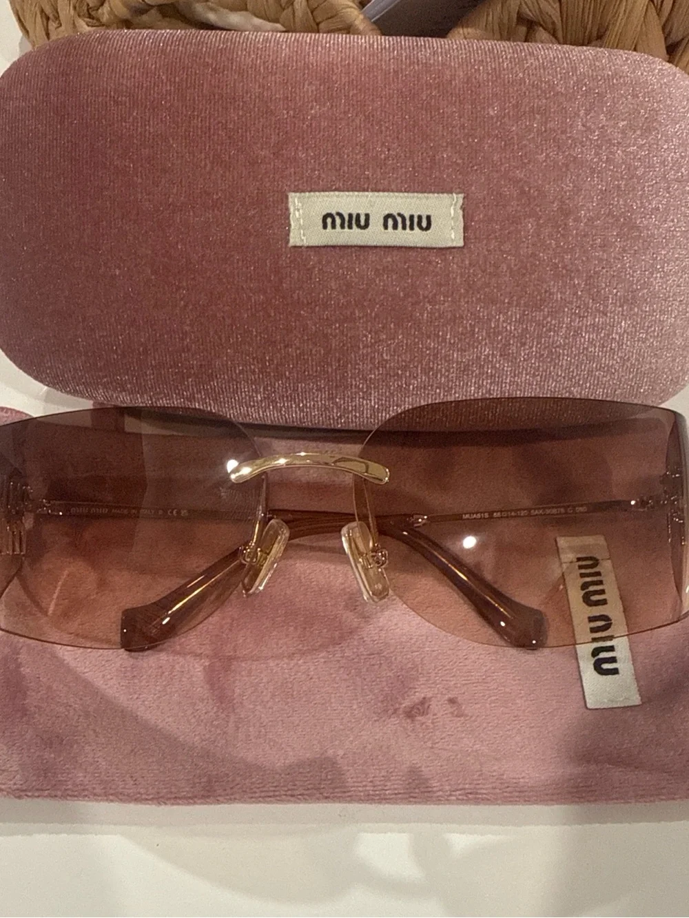 Miu Miu Brown Rimless Sunglasses with Gold Bridge
